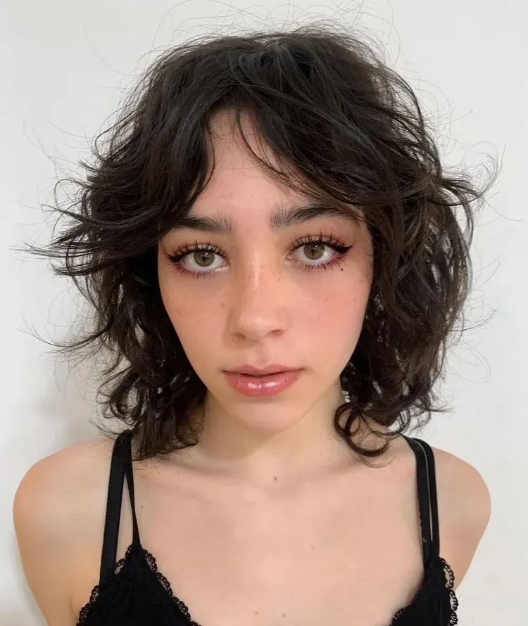 short wolf cut with curtain bangs