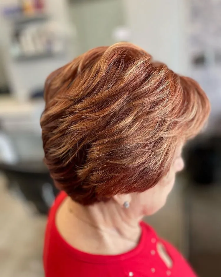 the strawberry blonde highlights look stunning and add a fresh touch