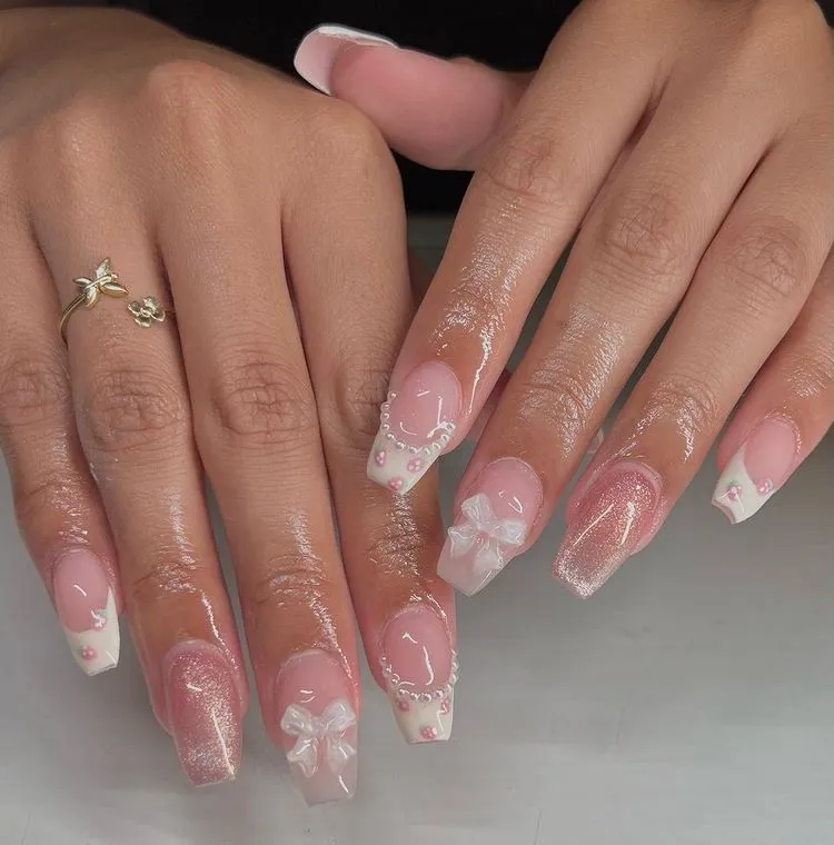white french tips and pink glitter nail art