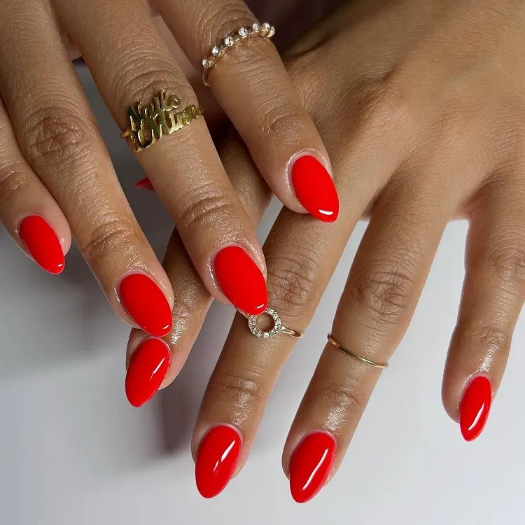 classic red nails are hot for winter 2024