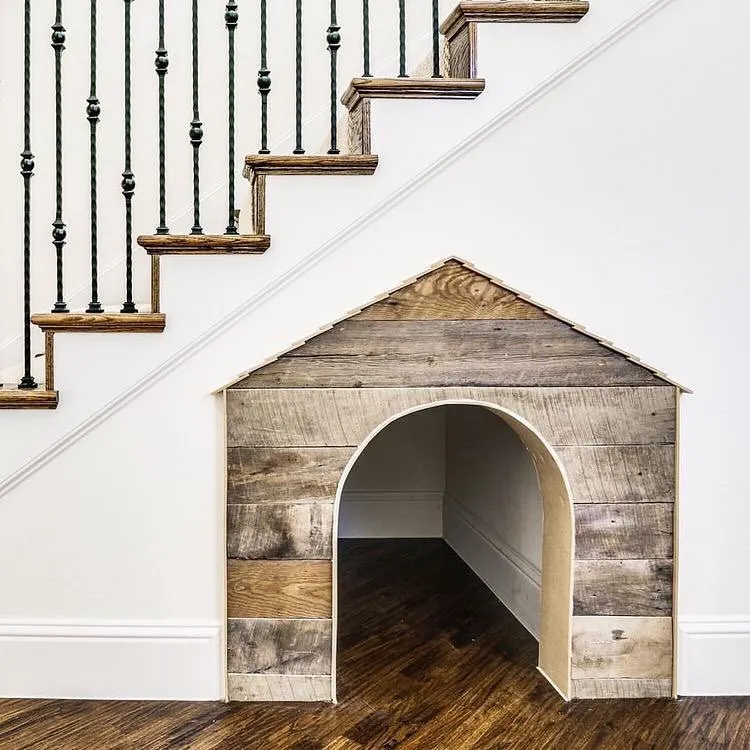 classic shape under stairs dog house made of natural wood