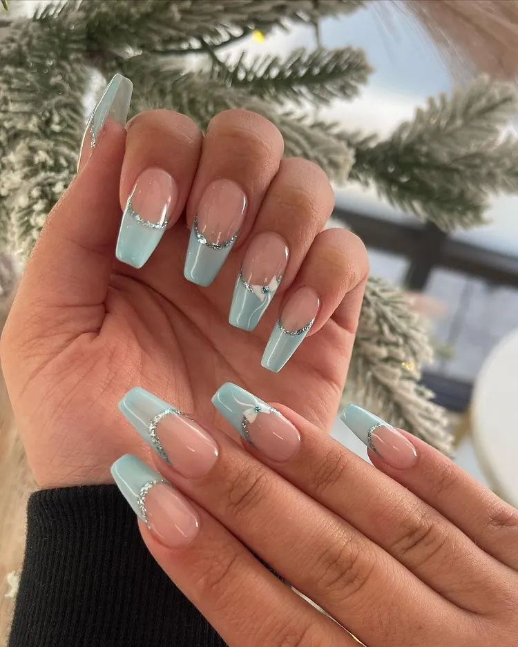 coffin light blue french tip nails with glitter