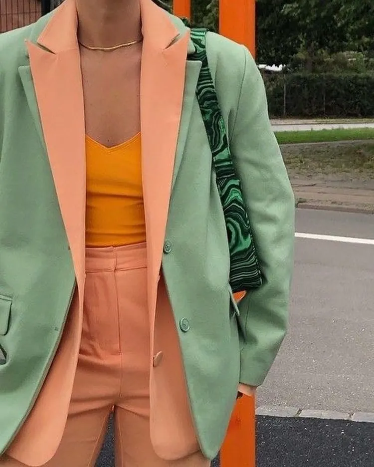 how to wear peach fuzz sage green bright orange prints