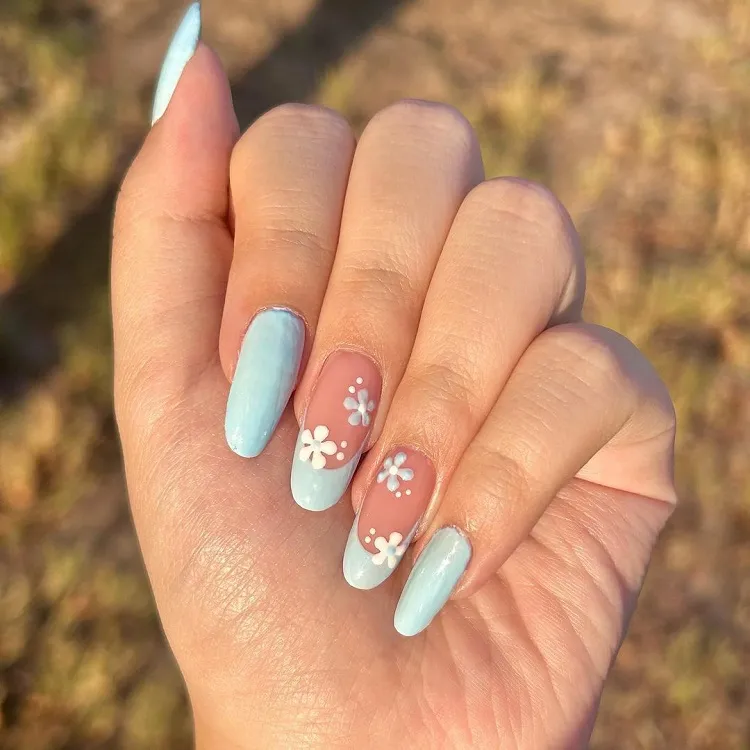 light blue french tips with flowers nail design