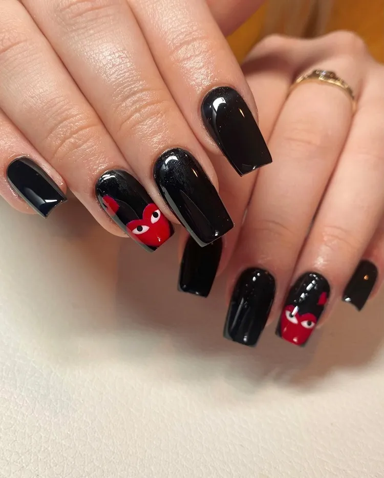 long square black nails with comme des garcons hearts