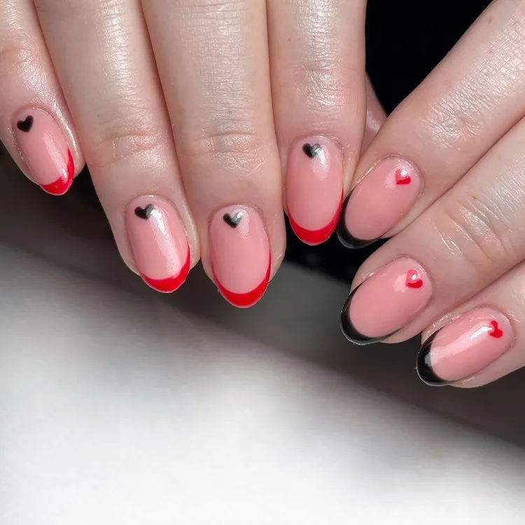 mismatched red and black french tips valentine's nails 2024