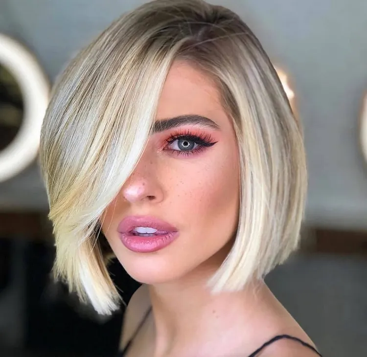 polished blunt bob with side bangs 2024