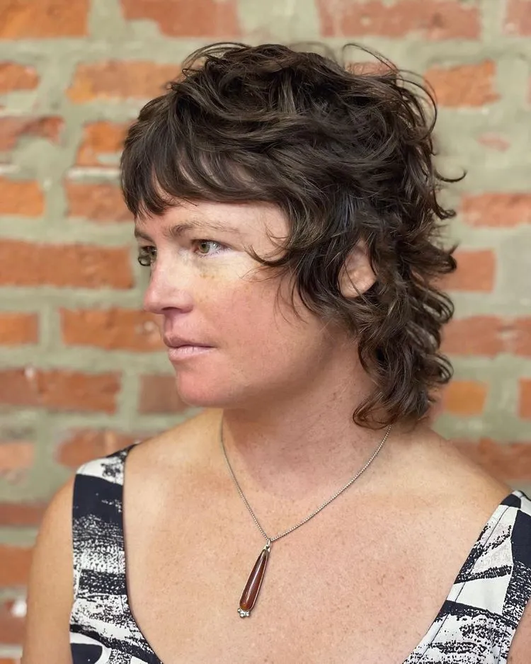 short curly shag for women over 50 low maintenance hairstyles