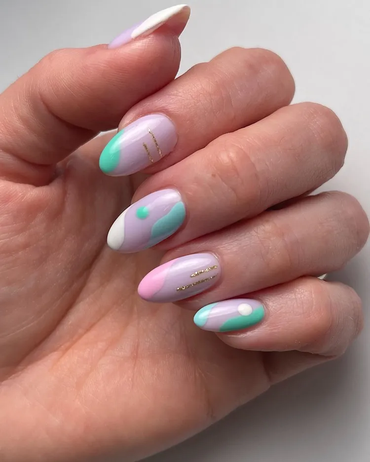 abstract nail art design for easter pastel purple blue pink