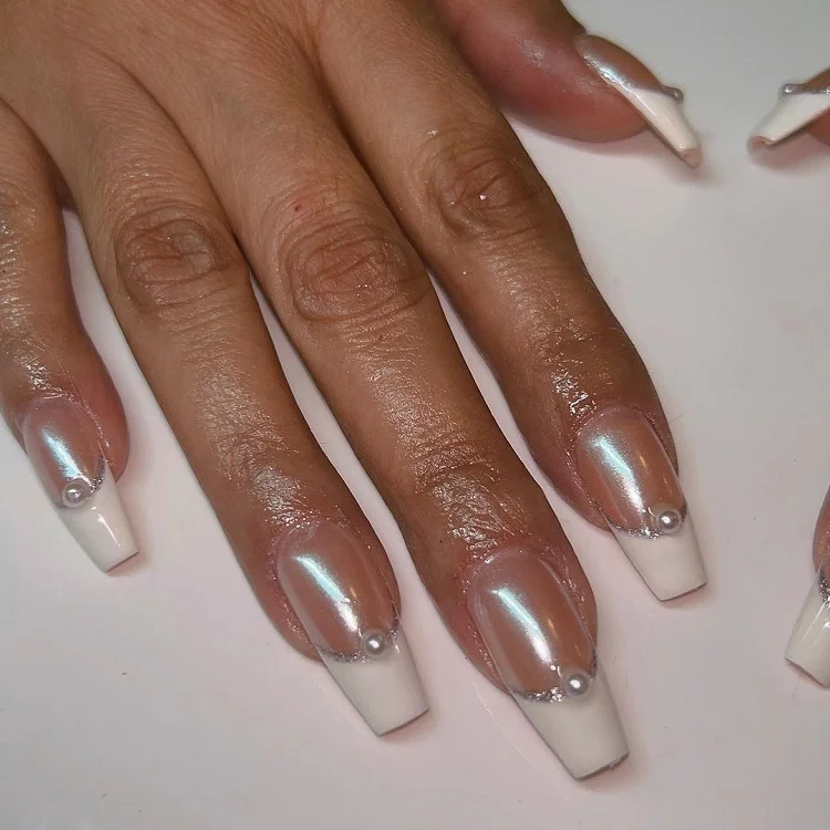 classy french tip with silver glitter line and pearls