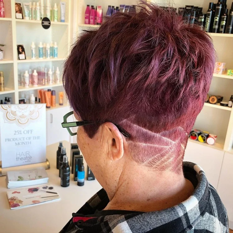 dark red spiky haircut with undercut for women over 60 with thick hair