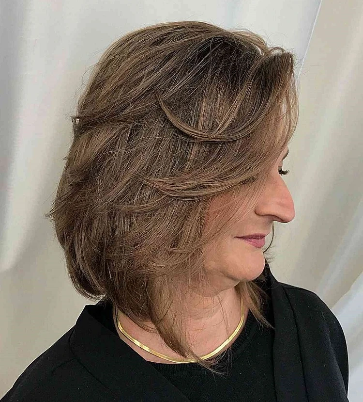 feathered layered bob for brunettes over 50