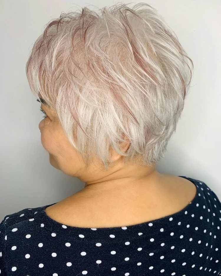 funky spiky pixie cut with red highlights for 60 year old woman