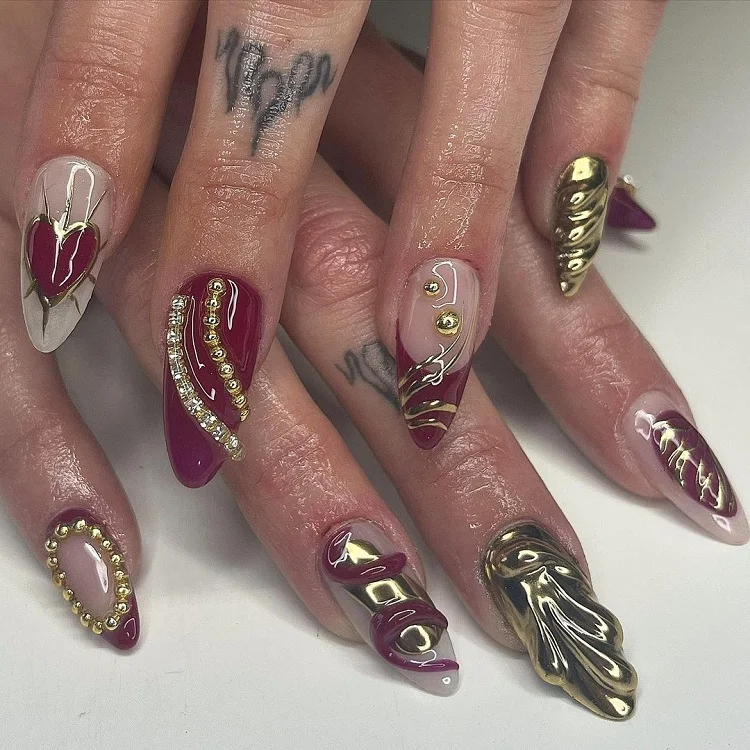 gold and burgundy red 3d mob wife manicure