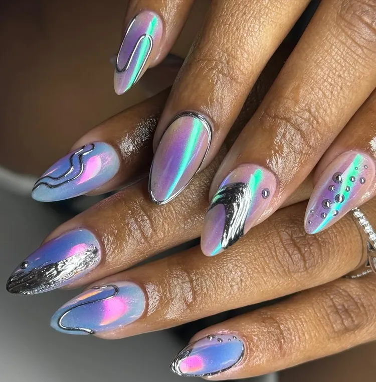 iridescent chrome nails with silver metallic abstract decorations