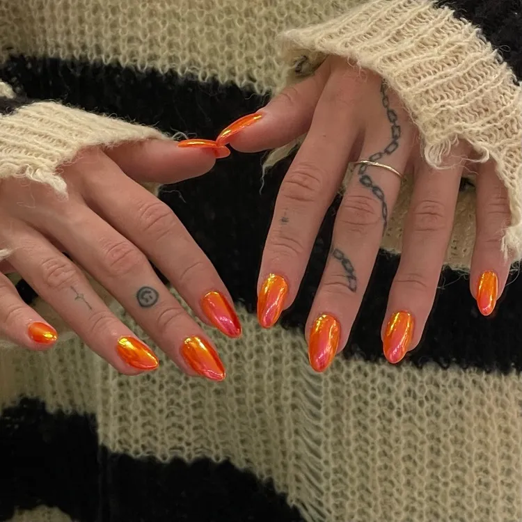 long oval neon orange and chrome manicure nail art trends 2024