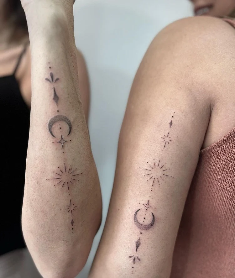 matching celestial tattoos