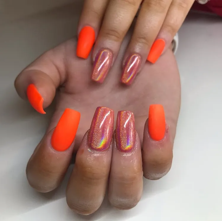 matter neon orange long square nails with chrome accents