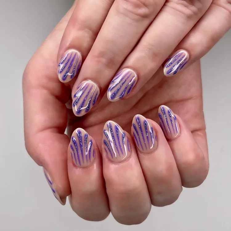 minimalist purple glitter shell nails