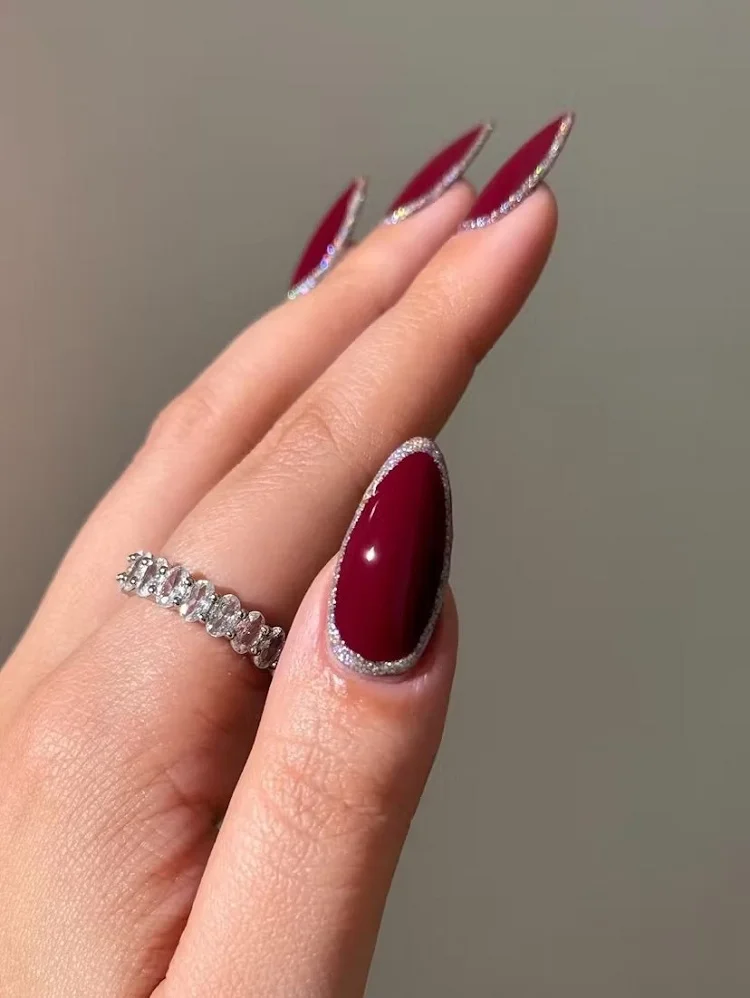 mob wife cherry red mocha nails with silver outlines
