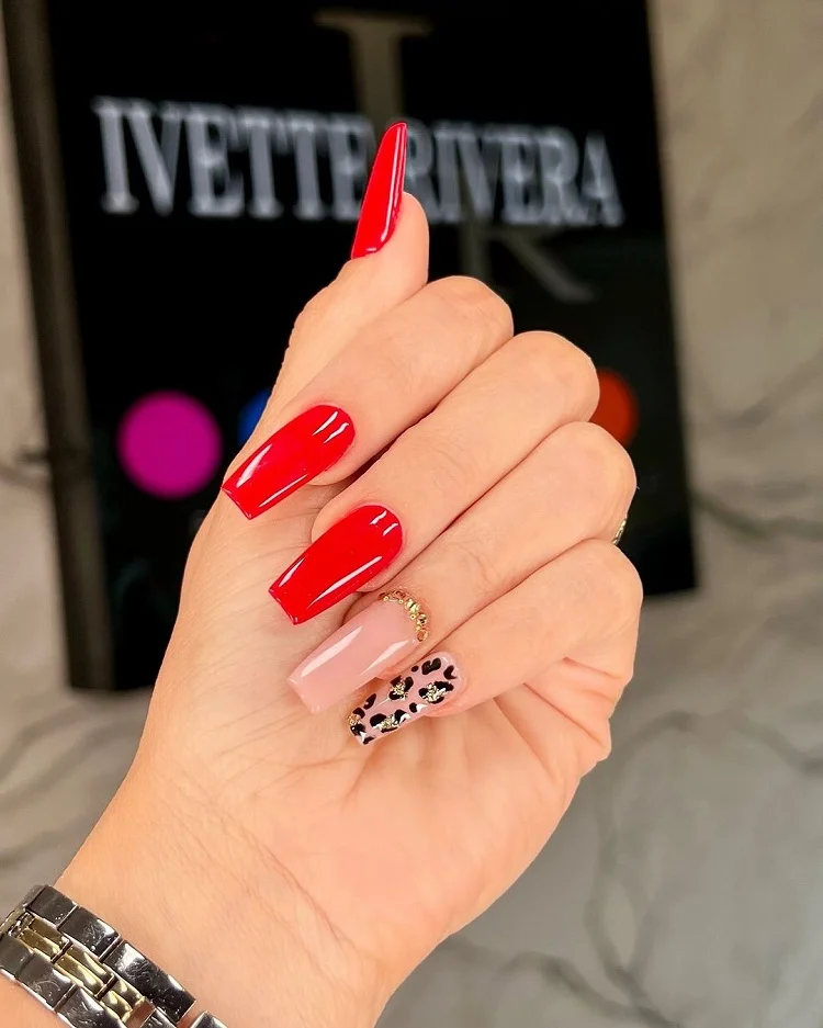 mob wife red nails with leopard print