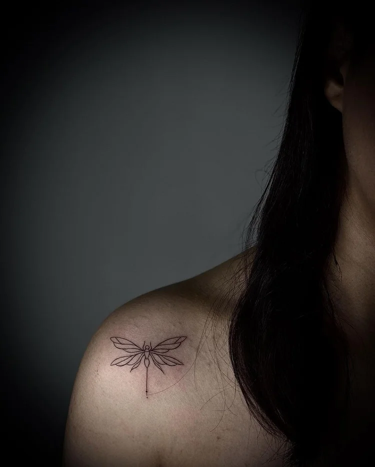 moth on shoulder tattoo women