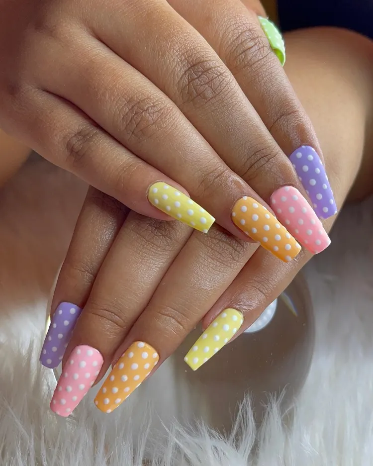 multicolor spring nails with white polka dot design for easter