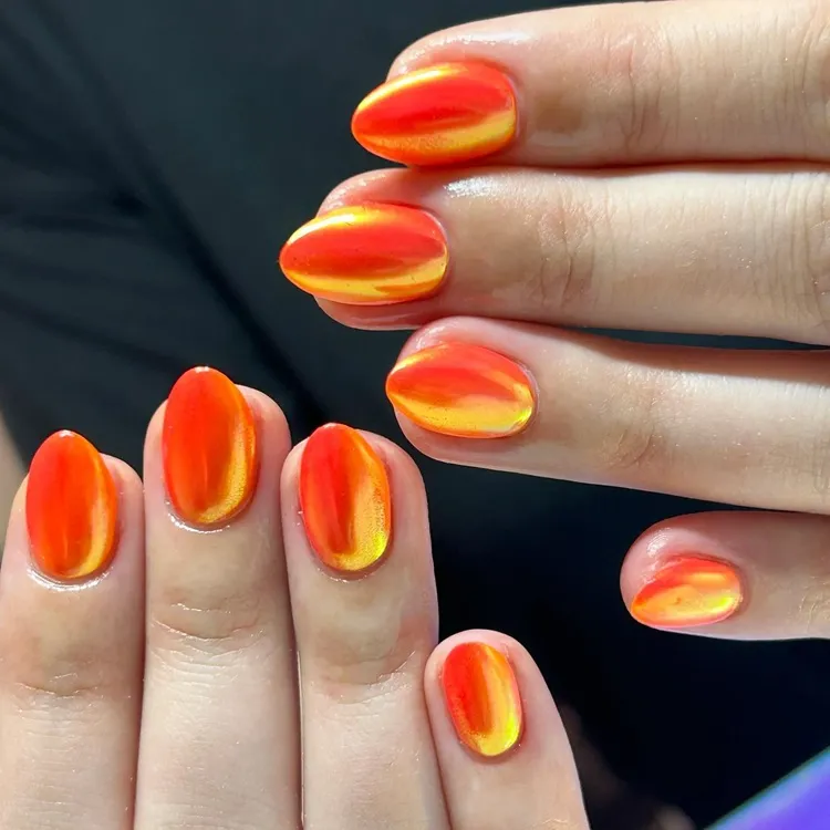 orange neon chrome short oval nails 2024 manicure inspo