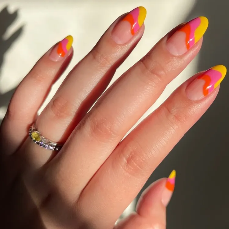 orange pink orange abstract french tip nails trend spring 2024