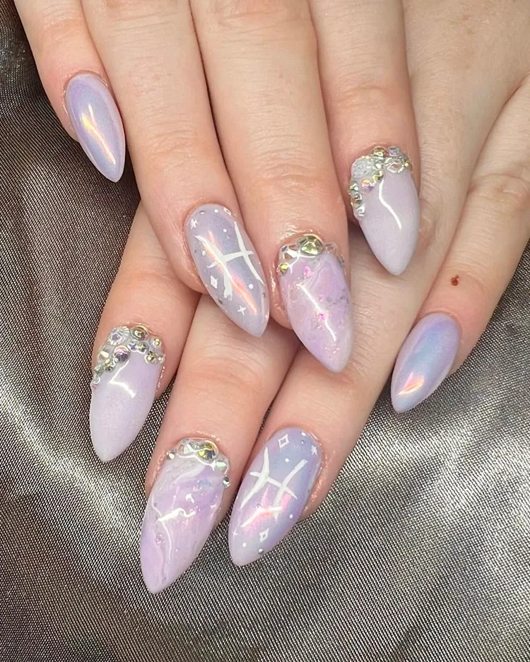 pastel purple pisces birthday nails design with gemstone decorations