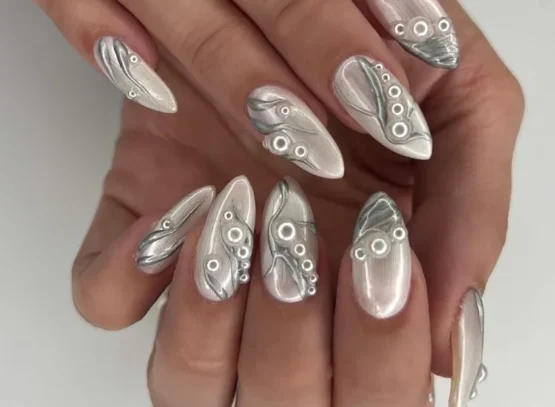 pearly nails with silver metallic decorations and mini pearls
