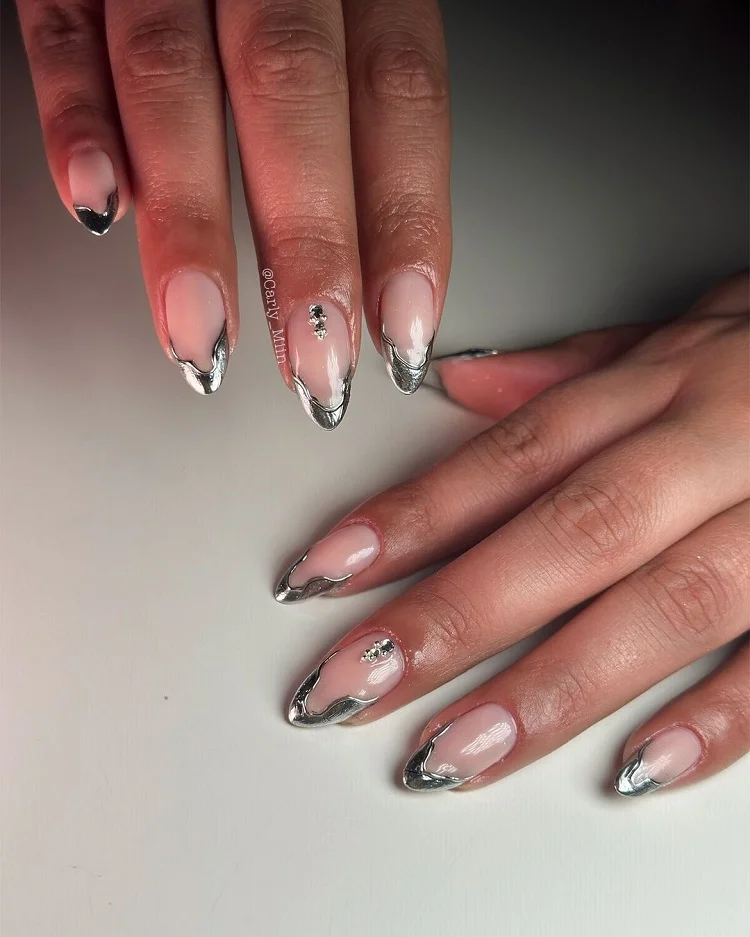 silver chrome french tip nails with rhinestones