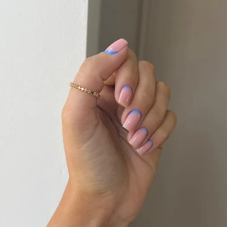 simple short square spring nails blue reverse french tips