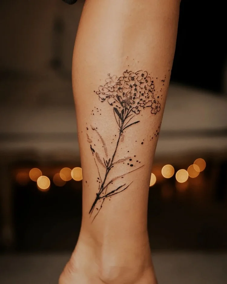 symbolic flower tattoo design for women 2024