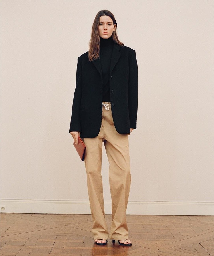 the row glenn jacket black minimalist overcoat fashion trends spring 2024