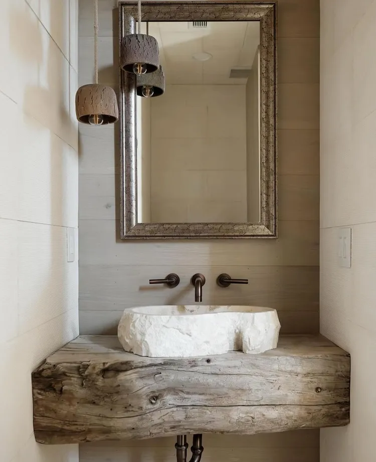 use of raw natural materials organic shapes modern minimalist bathroom design
